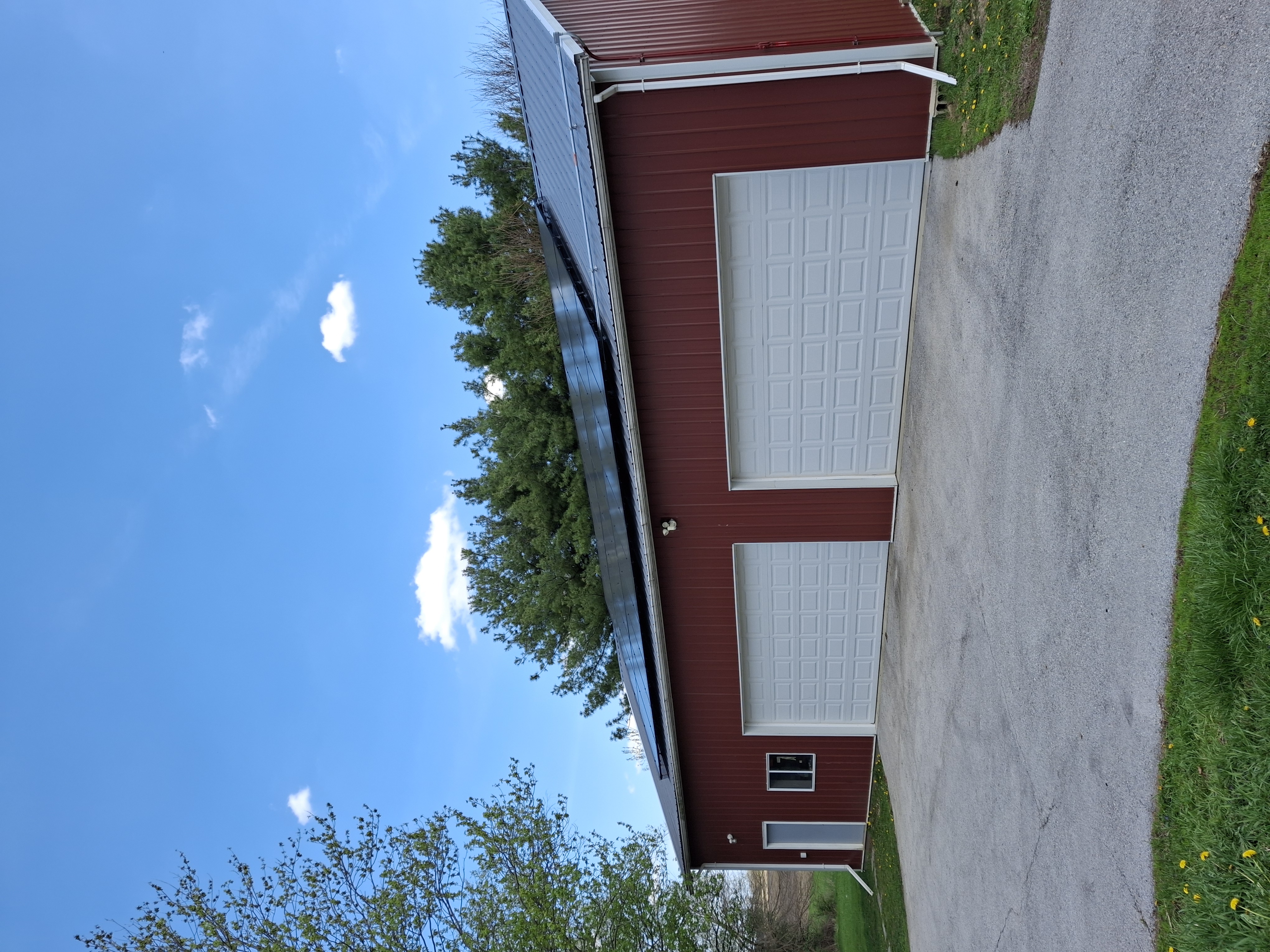 Solar panels on red barn outbuilding rural Illinois