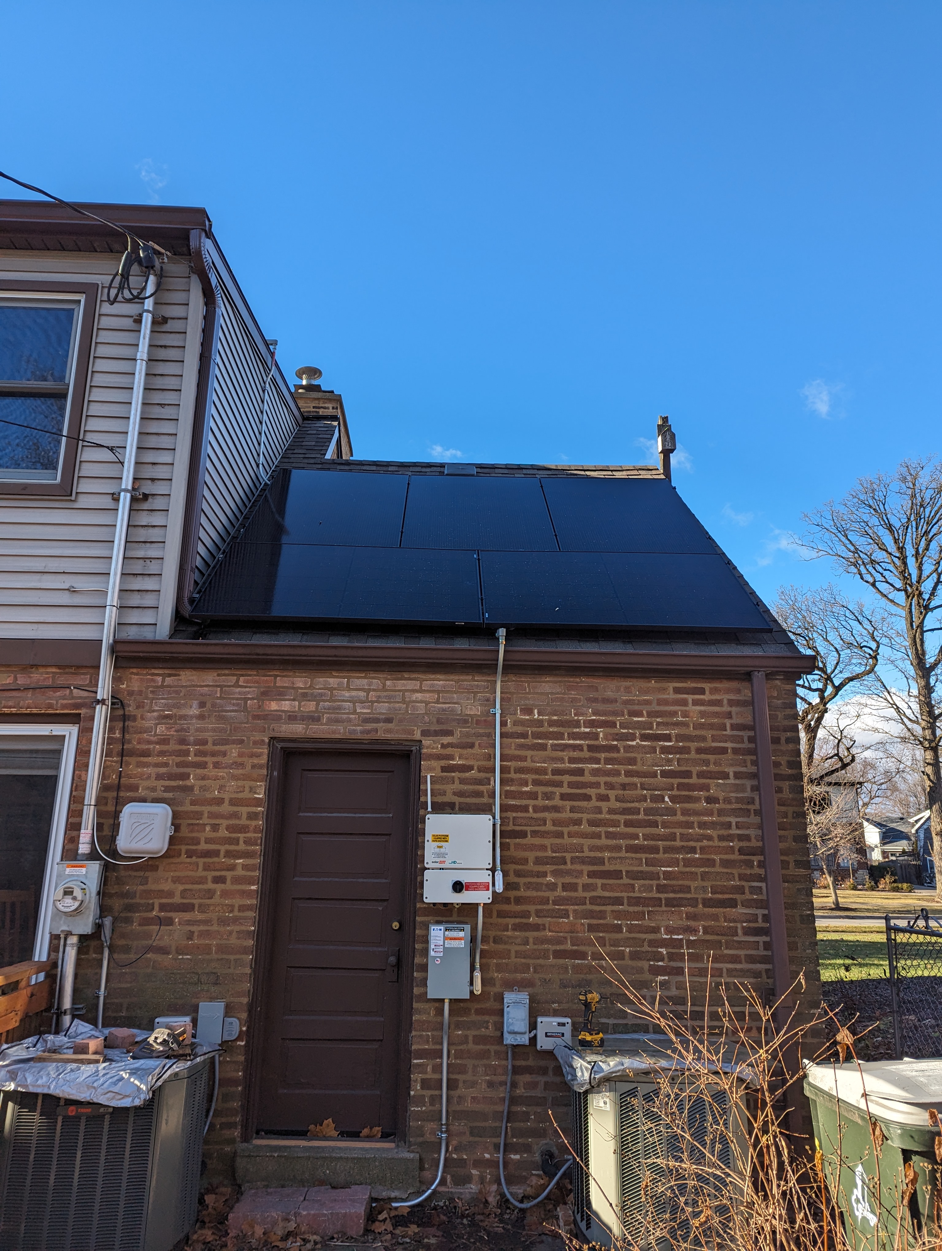 Rooftop solar brick home Illinois with inverter